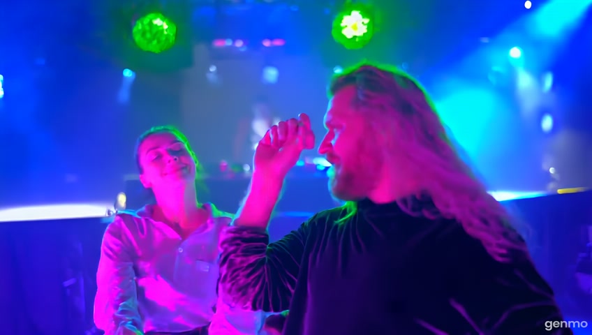 in a music club.   a few people are dancing  on the dance floor.  photo-realistic shot expresses joy and fun. no time-lapse
