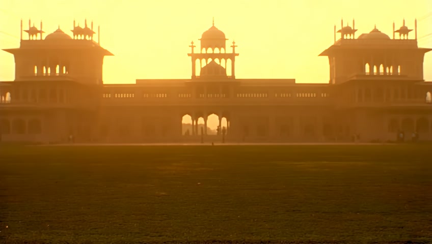 Various animals like goats, cows, antelope, buffalo, and sheep walking toward a grand palace as the sun rises.