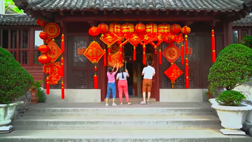 Chinese families putting up Spring Festival couplets