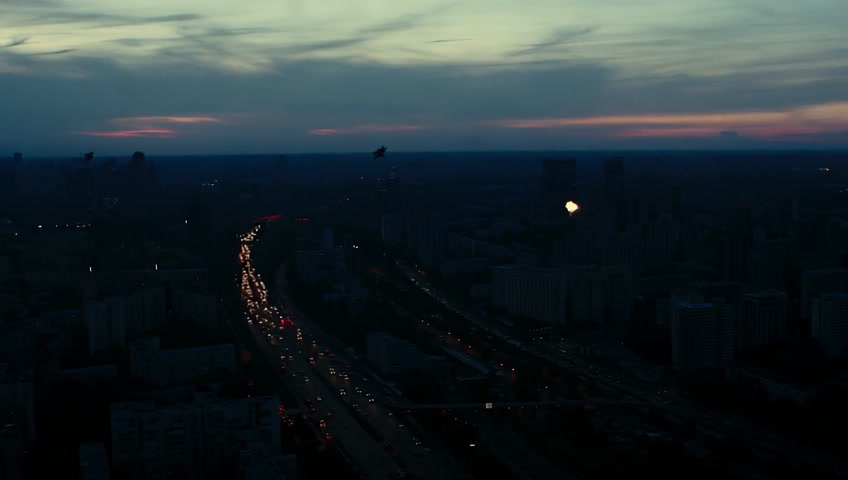 Left: Drones filling the sky over Kyiv, explosions in the background

Right: Ukrainian air defense systems firing interceptors
