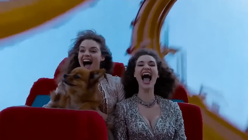 bright social media video, roller coaster car plunging down a steep drop, then whipping around sharp turns, with two attractive adult flirty female women in intricate outfits and their pet dog passengers screaming in excitement.  COHERENT I IMAX CLARITY, CRISP, VIVID.
