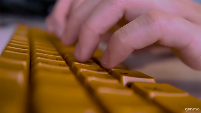 Create a ASMR video of man typing on honey keyboard with realistic sounds for 20 seconds