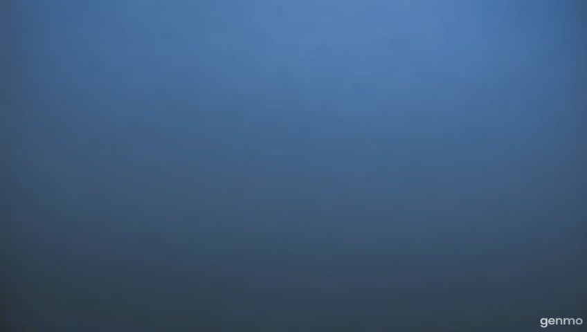 A time-lapse of a city skyline as fog rolls in and envelops buildings. The camera captures the changing atmosphere and mood