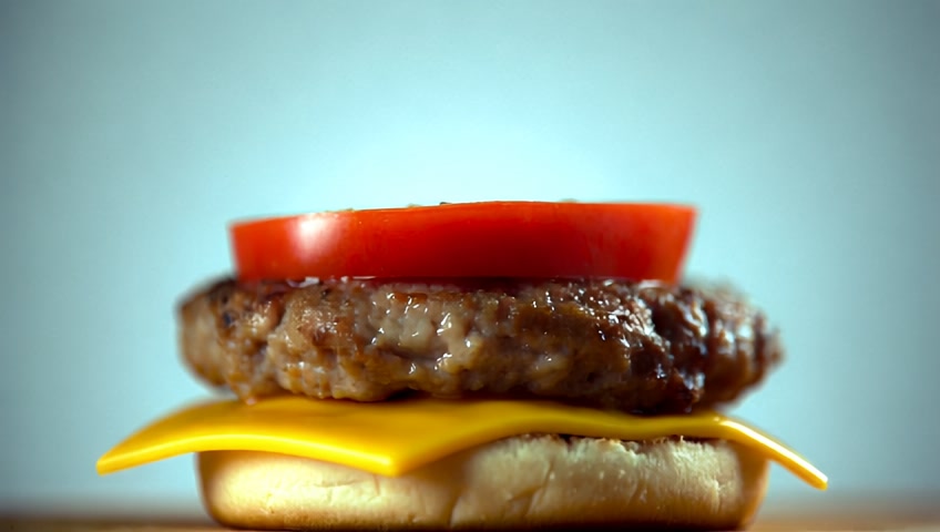 Super Slow Motion Shot of Falling and Stacking Parts of Hamburge