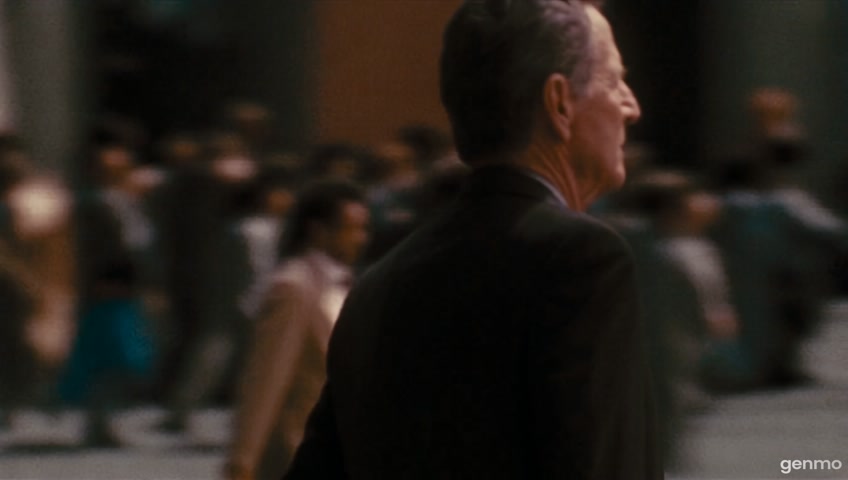 A guy is walking down the street, and a nuclear explosion occurs during which he gets into a helicopter and flies away
