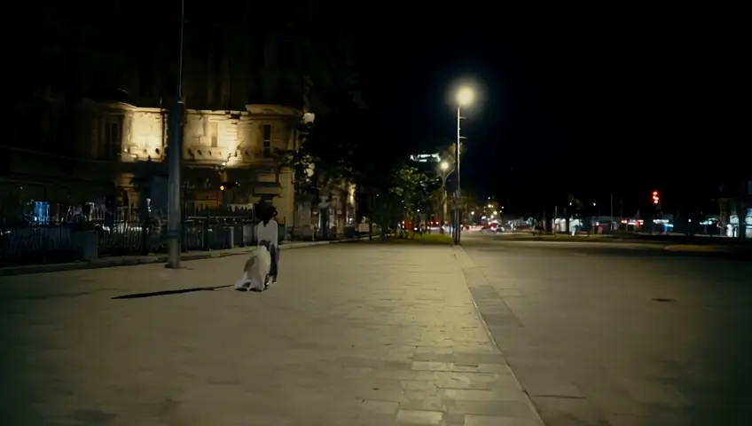 girl walking at night on the street