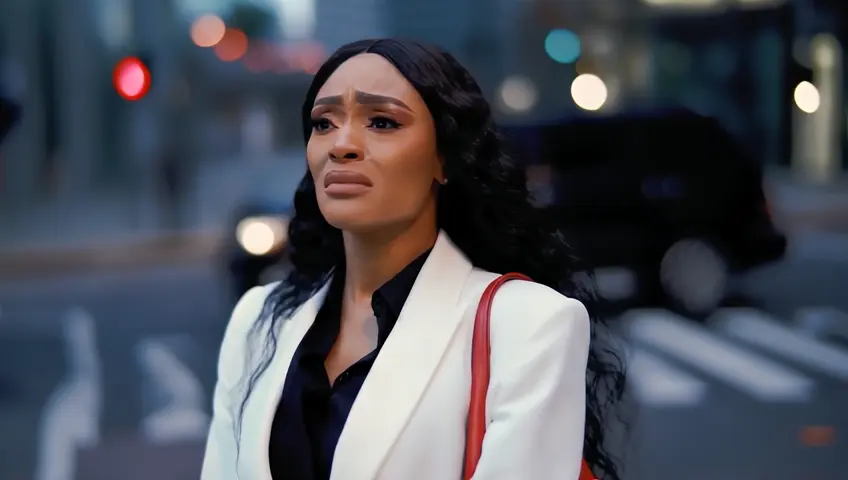 at night in the city, a crying woman with Long wavy Black Hair in a white business suit and black formal undershirt carrying a red handbag purse crying with tiers on her cheeks walking across the road in front of black SUV car