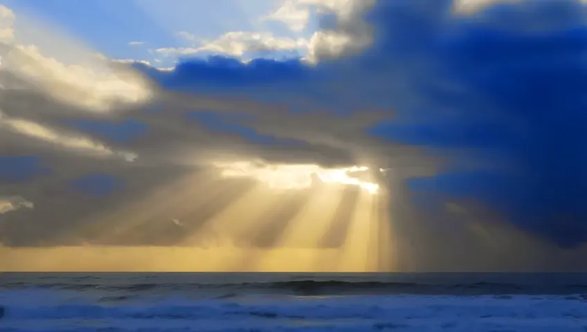 The clouds stretch far across the horizon, their shapes fluid and ever-changing, yet unmistakably regal. In the spaces between, the light filters through in beams, casting faint blue and gold hues upon the towering water walls below. The mane seems to move with intention, not just a formation of nature, but a celestial guardian watching over the parted sea. It hangs suspended in the sky like a crown for the miracle unfolding, a symbol of untamed power and divine grace, eternal and infinite.