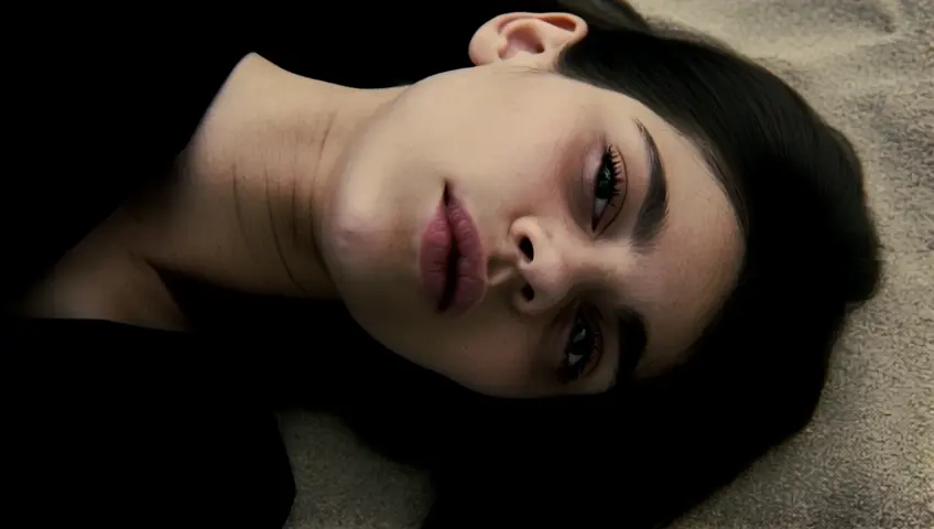 A girl lying in the sand transforms into the Nile River,  full body view, in the Surreal Style of Dali and Magritte, Photo Realistic, Anatomically accurate, realistic skin tone, 8k resolution, realistic natural motion, fluid dynamics, hyperdetailed, cinematic Noir lighting,