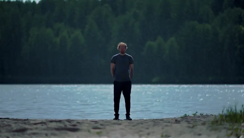 Gusts of wind ruffle the hair on his head. It starts to rain. The river turns into a raging torrent. The boat is carried swiftly through the water