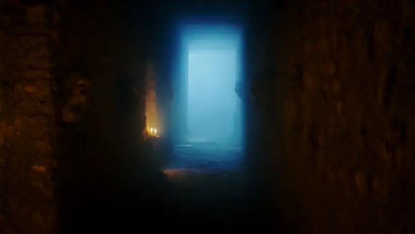 "Now, draw a picture in which the traveller is seen running down the narrow and dark corridor of the fort, looking back in fear. There is a thick fog in the air, and ghostly figures are seen on the walls, with faces that are cruel and sad. The traveller's face is seen in the dim light of an extinguished candle, as if he is trying to somehow get out of the fort."