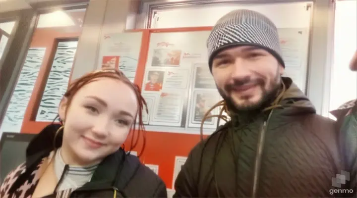 a man and a woman with standing next to each other