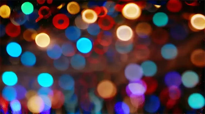 a blurry photo of colorful lights in the dark