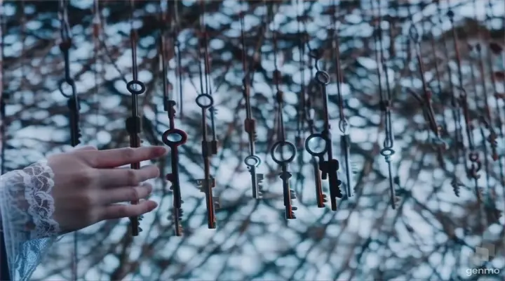 a person holding a bunch of keys in their hand, 16:9