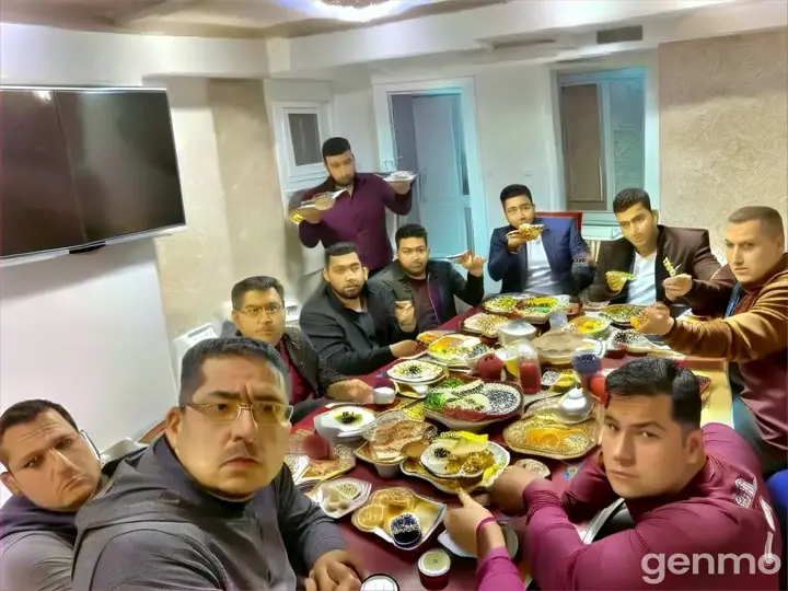 a group of men sitting around a table eating food