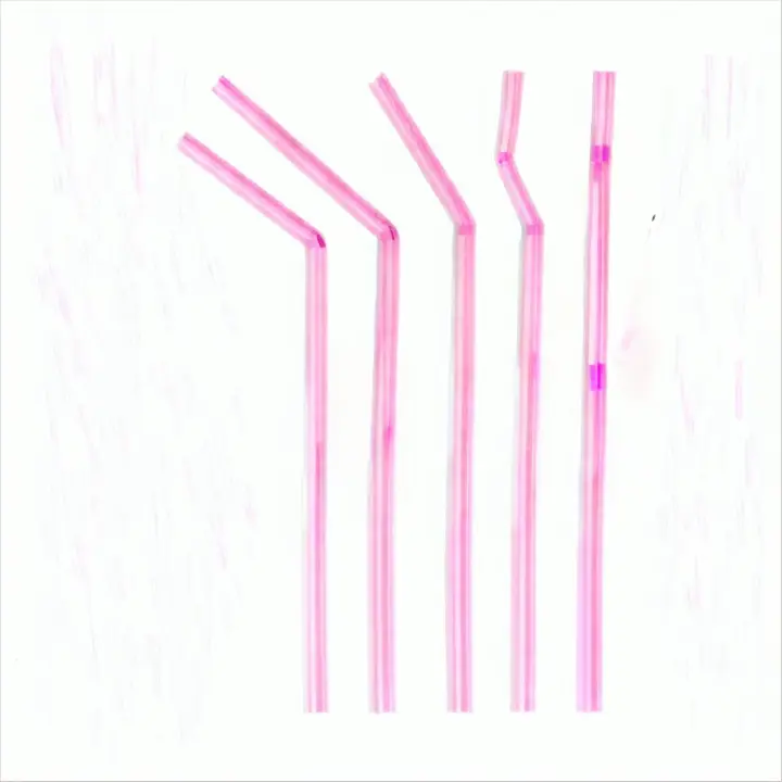 six pink straws are lined up in a row