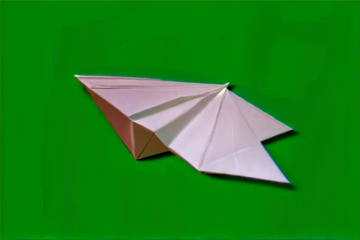 Flying paper airplane