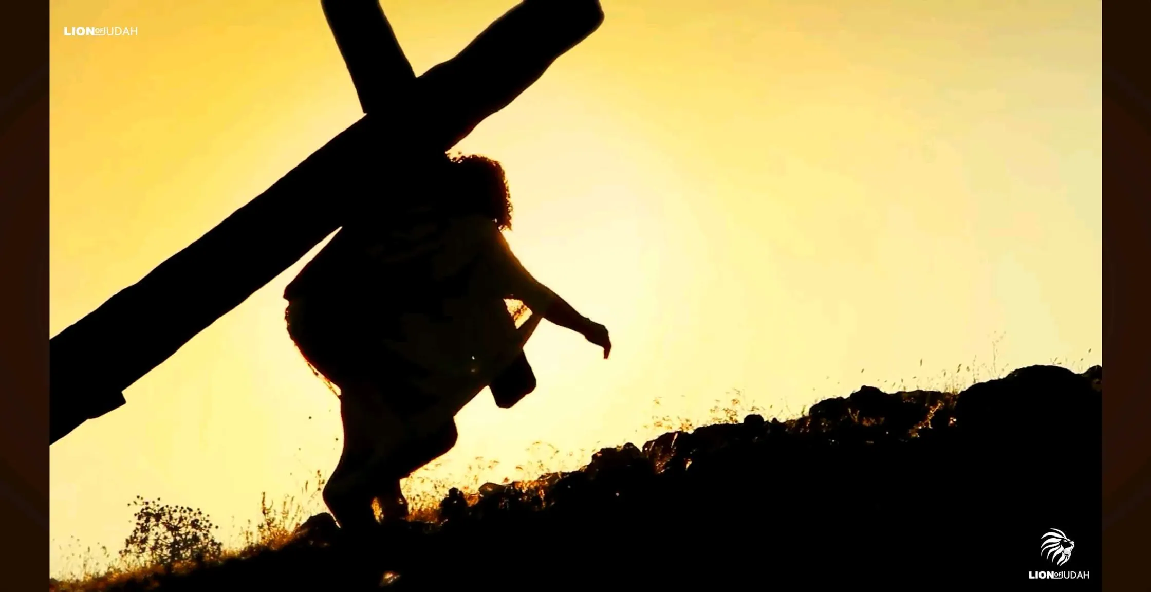 man struggles to carry the cross up the hill to the right, advertising style