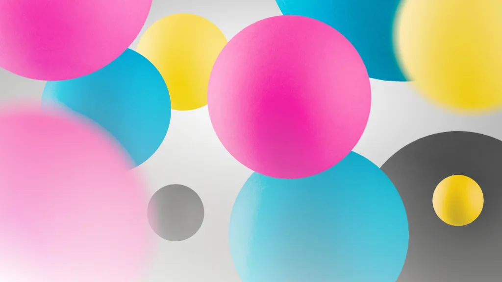 a group of colorful balls floating in the air