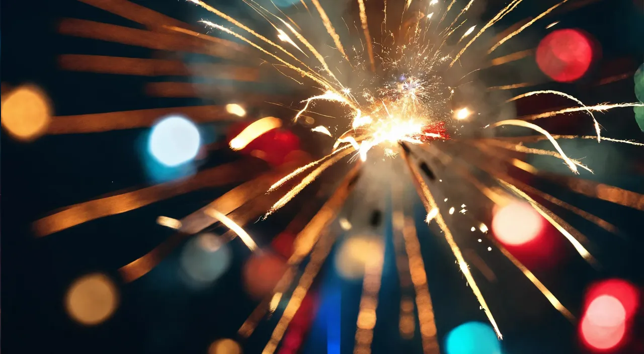 a colorful fireworks is lit up in the night sky