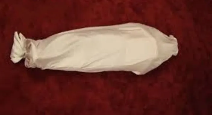 a piece of white paper wrapped in a plastic bag