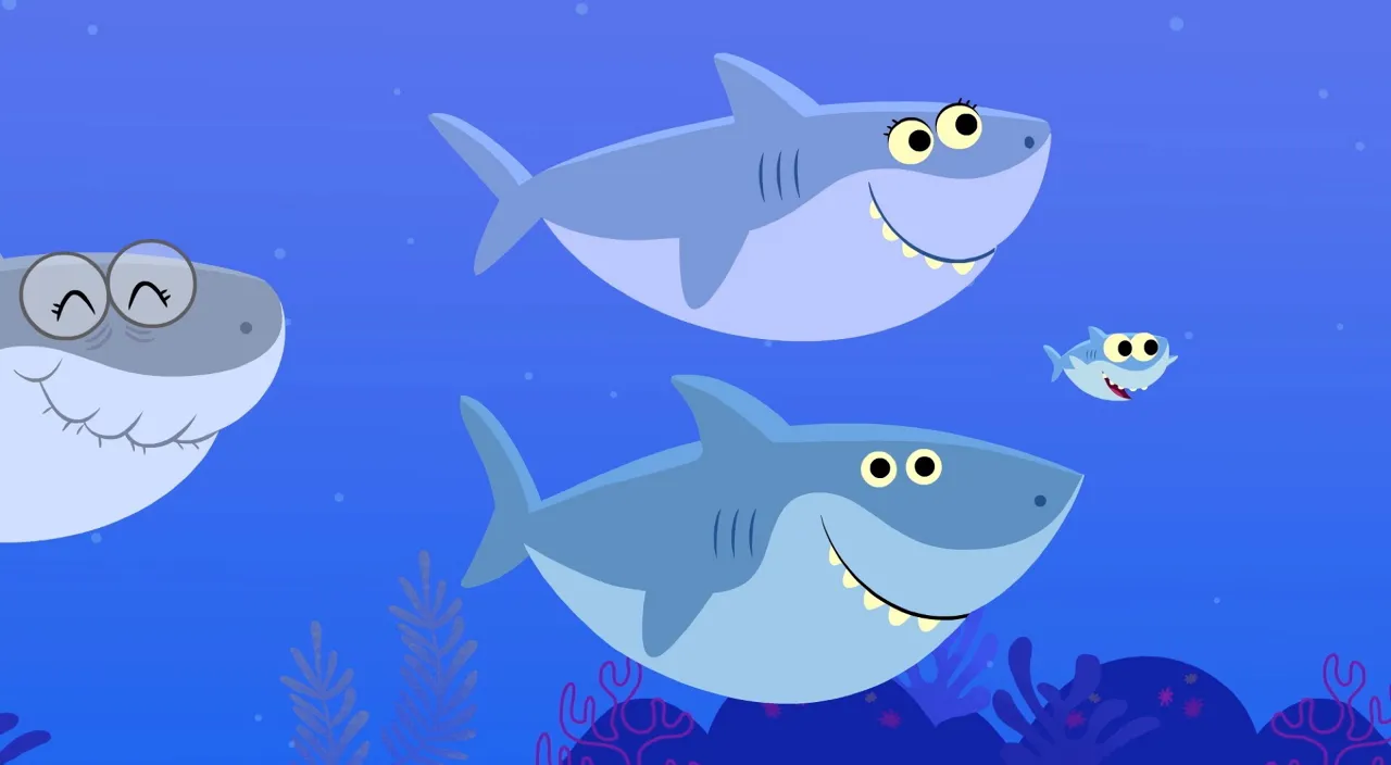 a group of cartoon sharks swimming in the ocean