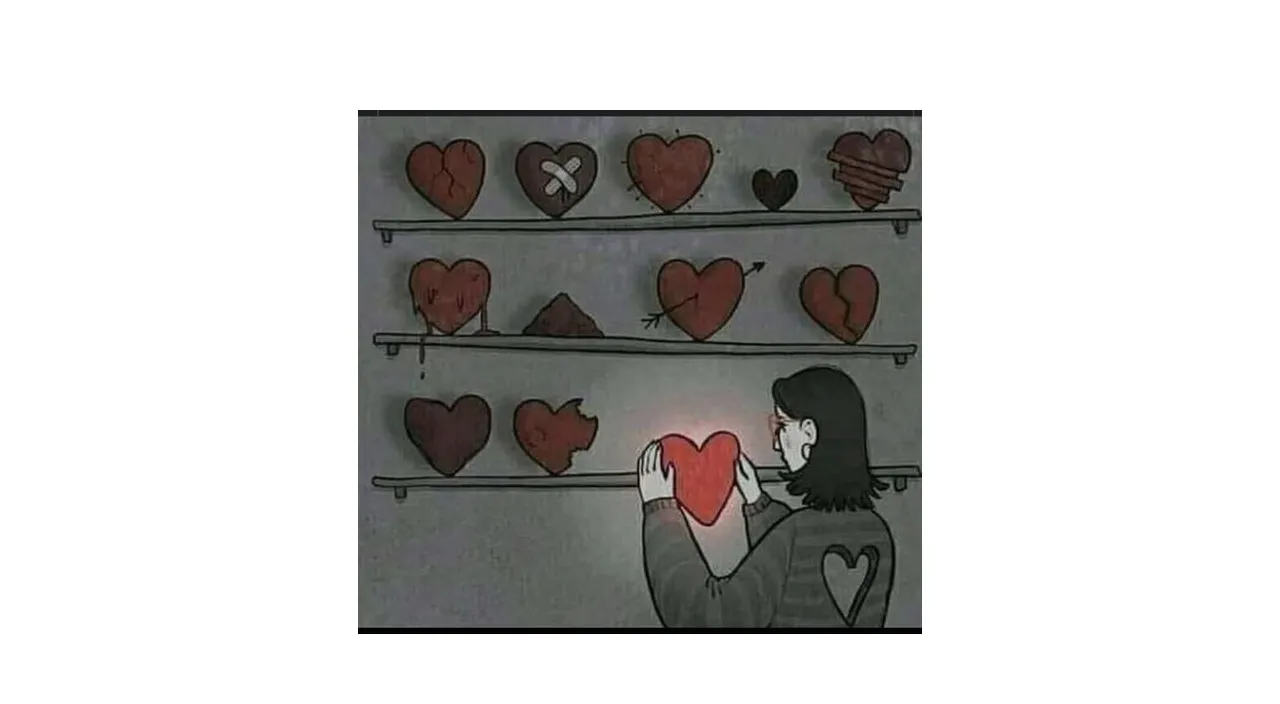 a woman holding a heart in front of a wall of hearts