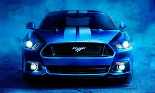 the front of a blue mustang mustang car