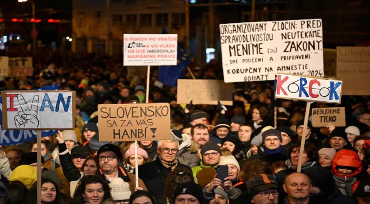 a large group of people holding up signs