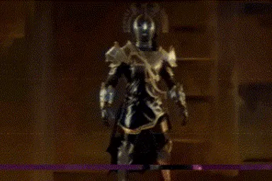 a man dressed in armor standing on a stage