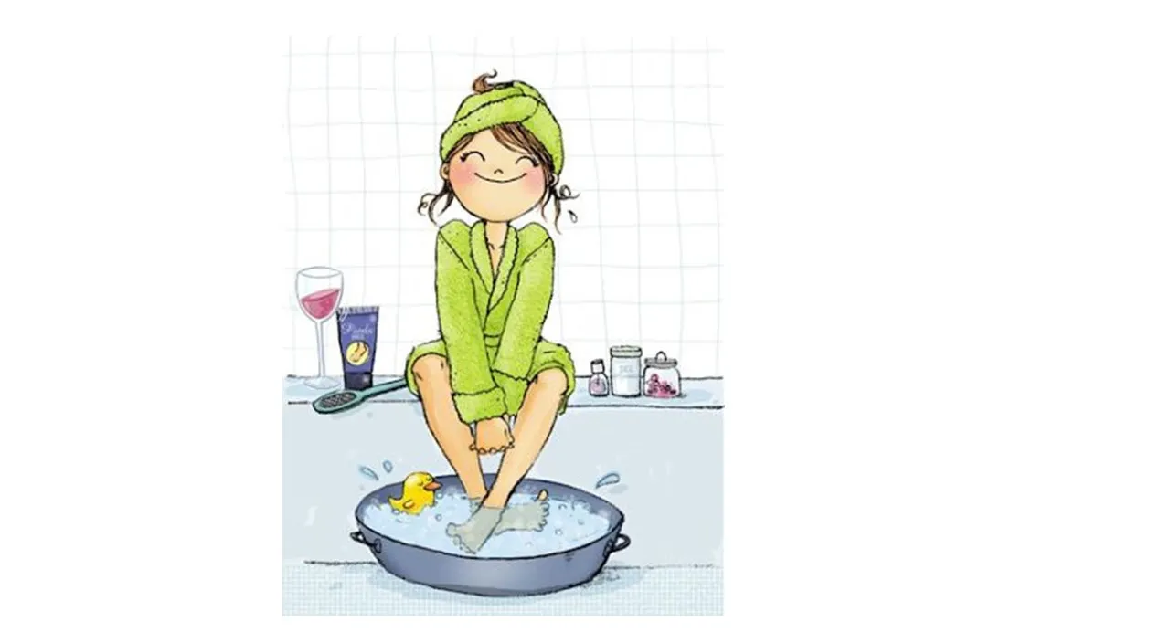 a girl in a green bathrobe is washing her hands