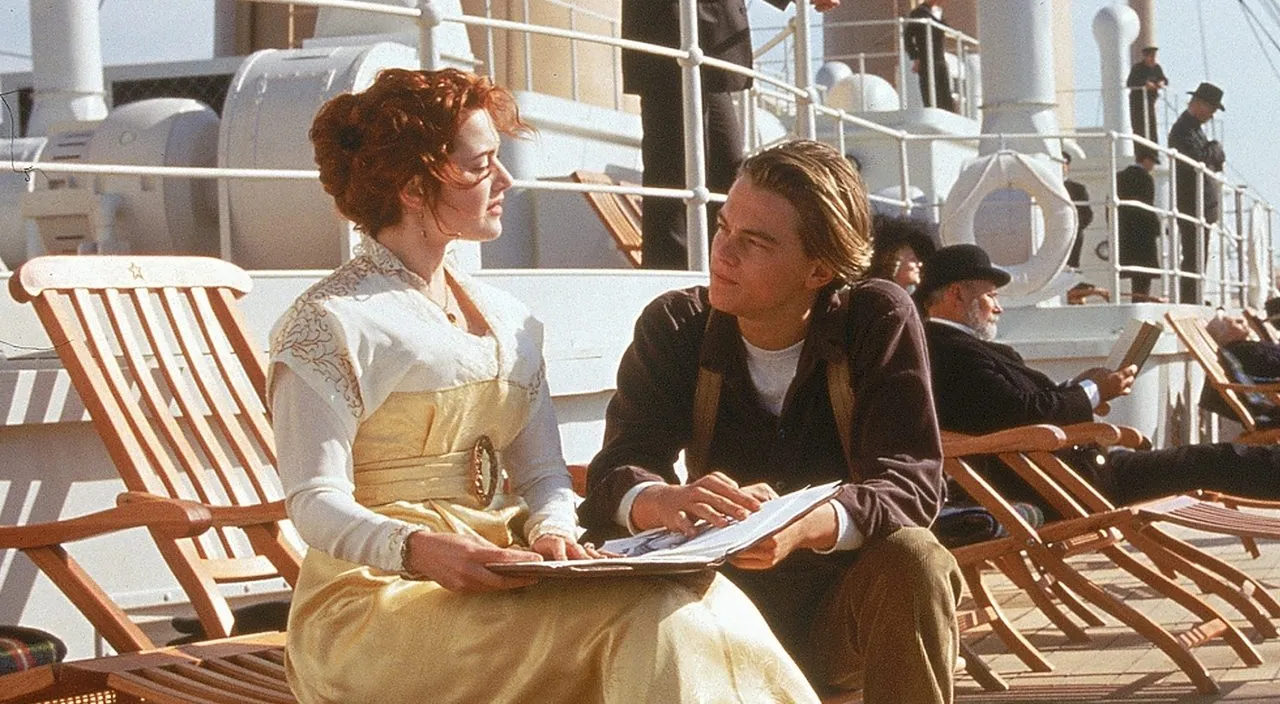 a man and a woman sitting next to each other on a boat