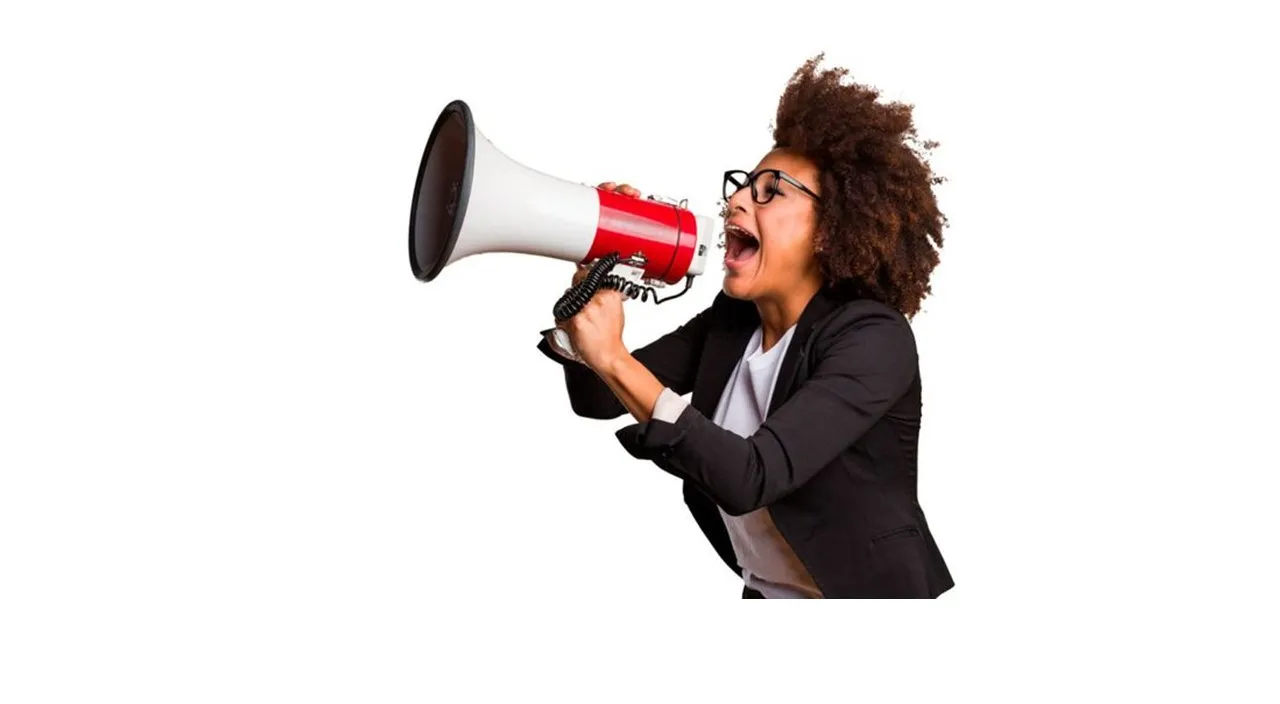 a woman holding a red and white megaphone