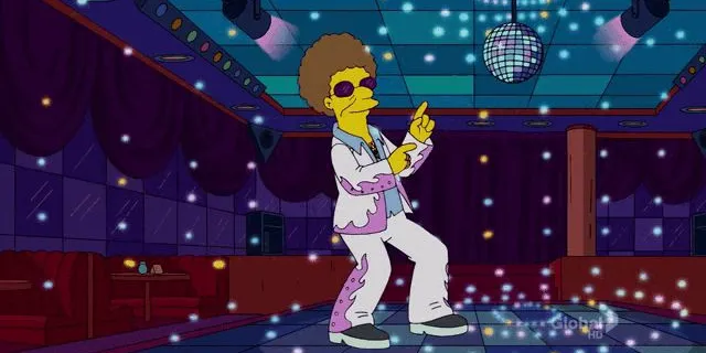 a man in a white suit and sunglasses on a dance floor