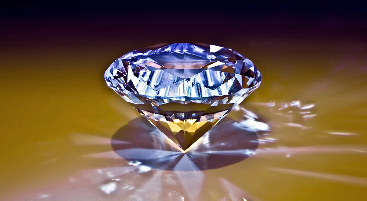 a diamond is shown on a yellow background