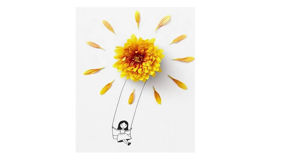 a yellow flower that is floating in the air