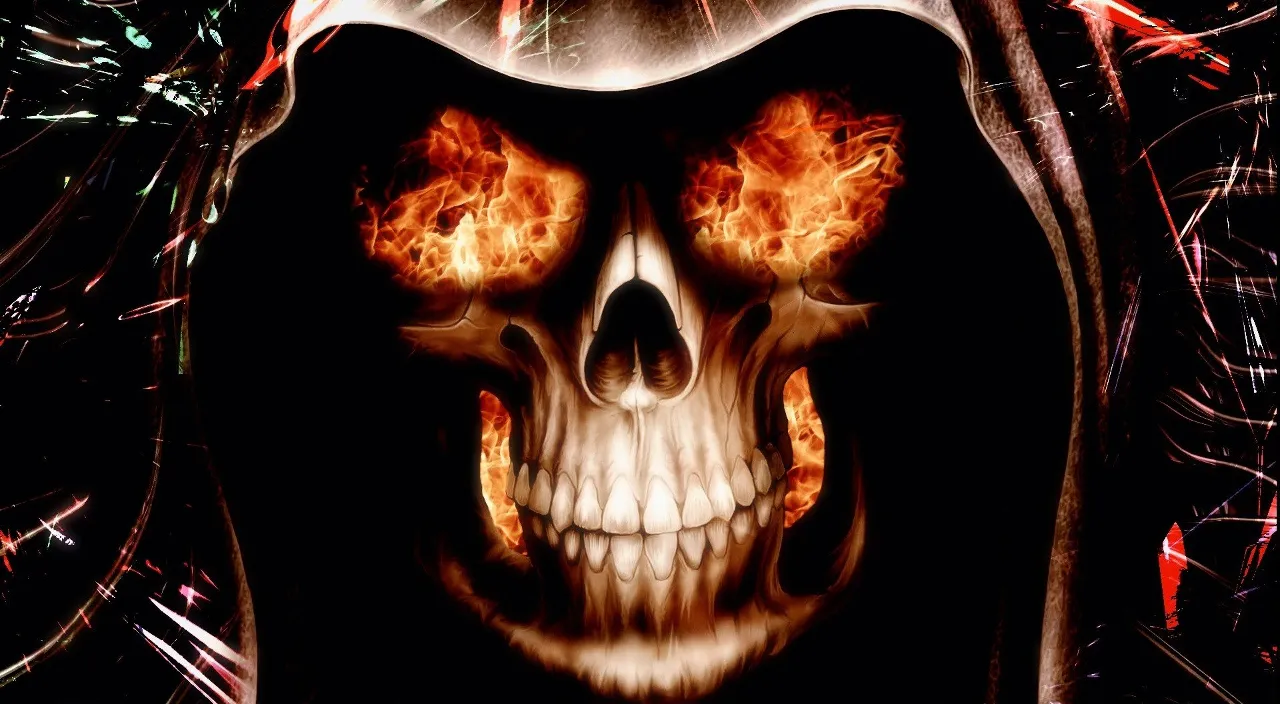 a skull with flames in its eyes