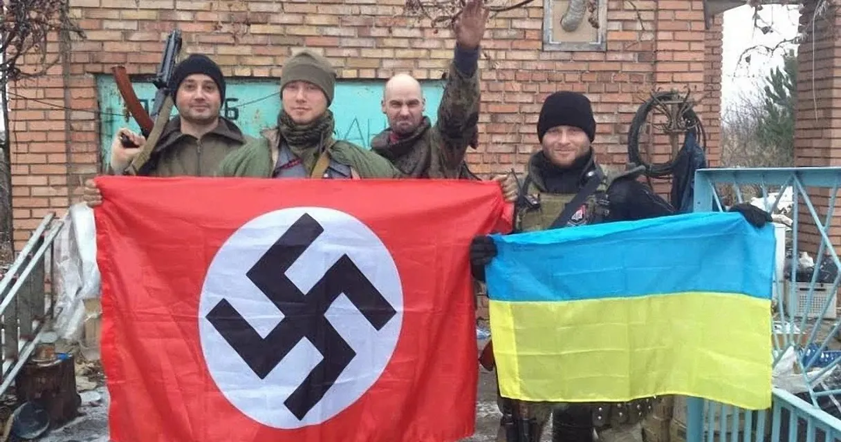 a group of men holding up a flag