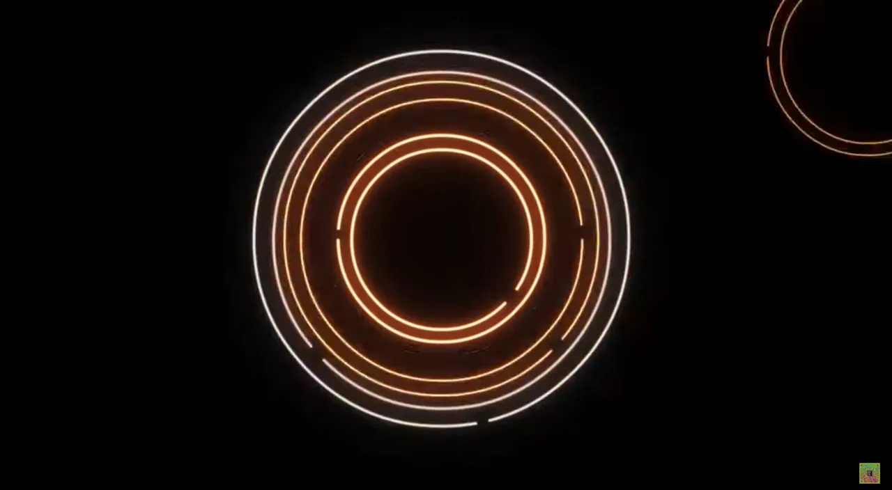 a close up of a circular light in the dark