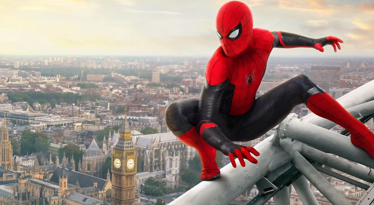 a man in a spider - man suit is on top of a building