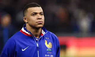 a close up of mbappe wearing a France jacket