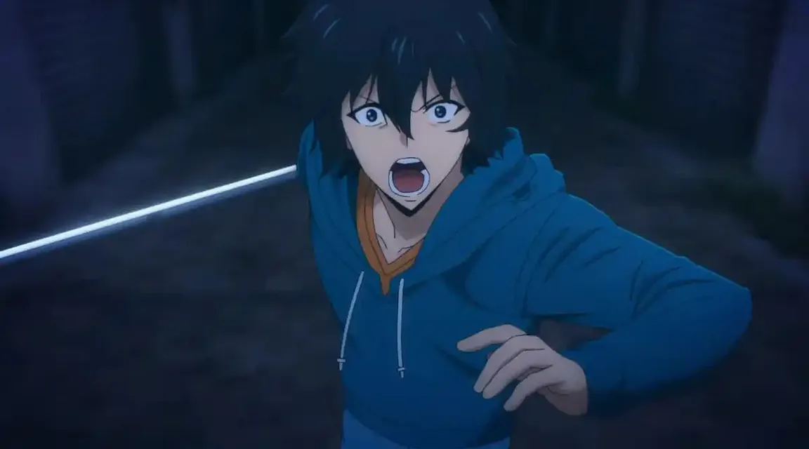 a man in a blue hoodie with his mouth open