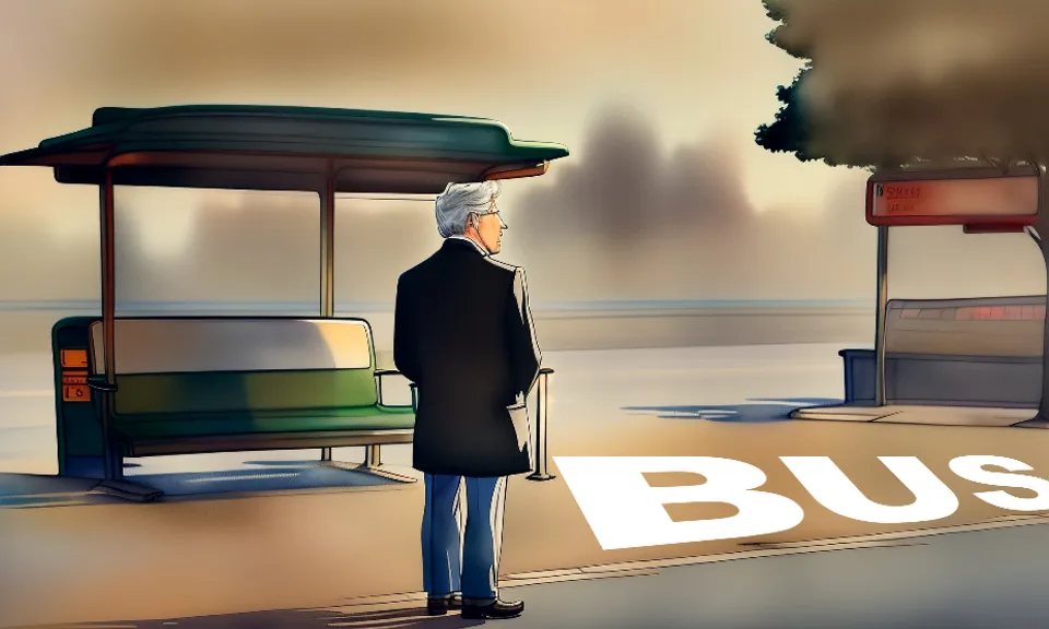 a man standing in front of a bus stop