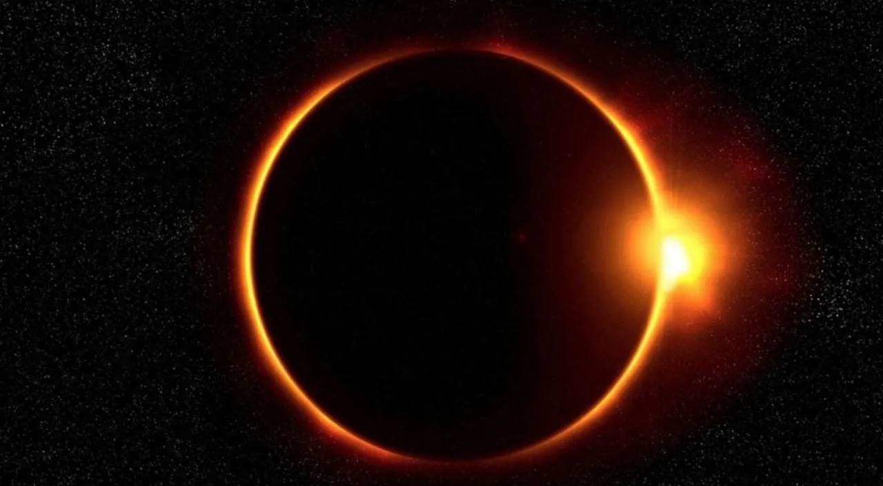 a solar eclipse is seen in the dark sky