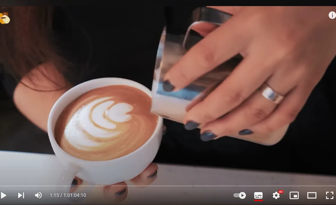 a woman is pouring a cup of coffee