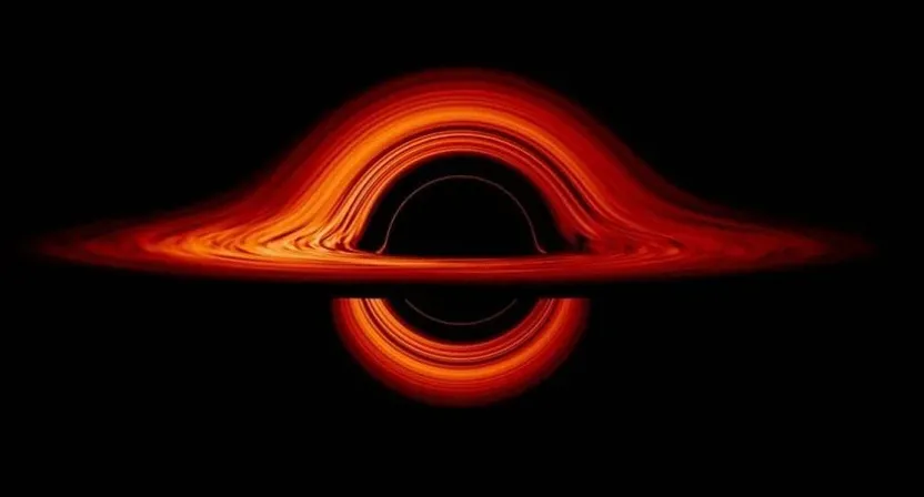 a black background with a red swirl in the middle