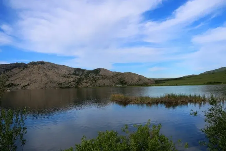 a large body of water surrounded by mountains