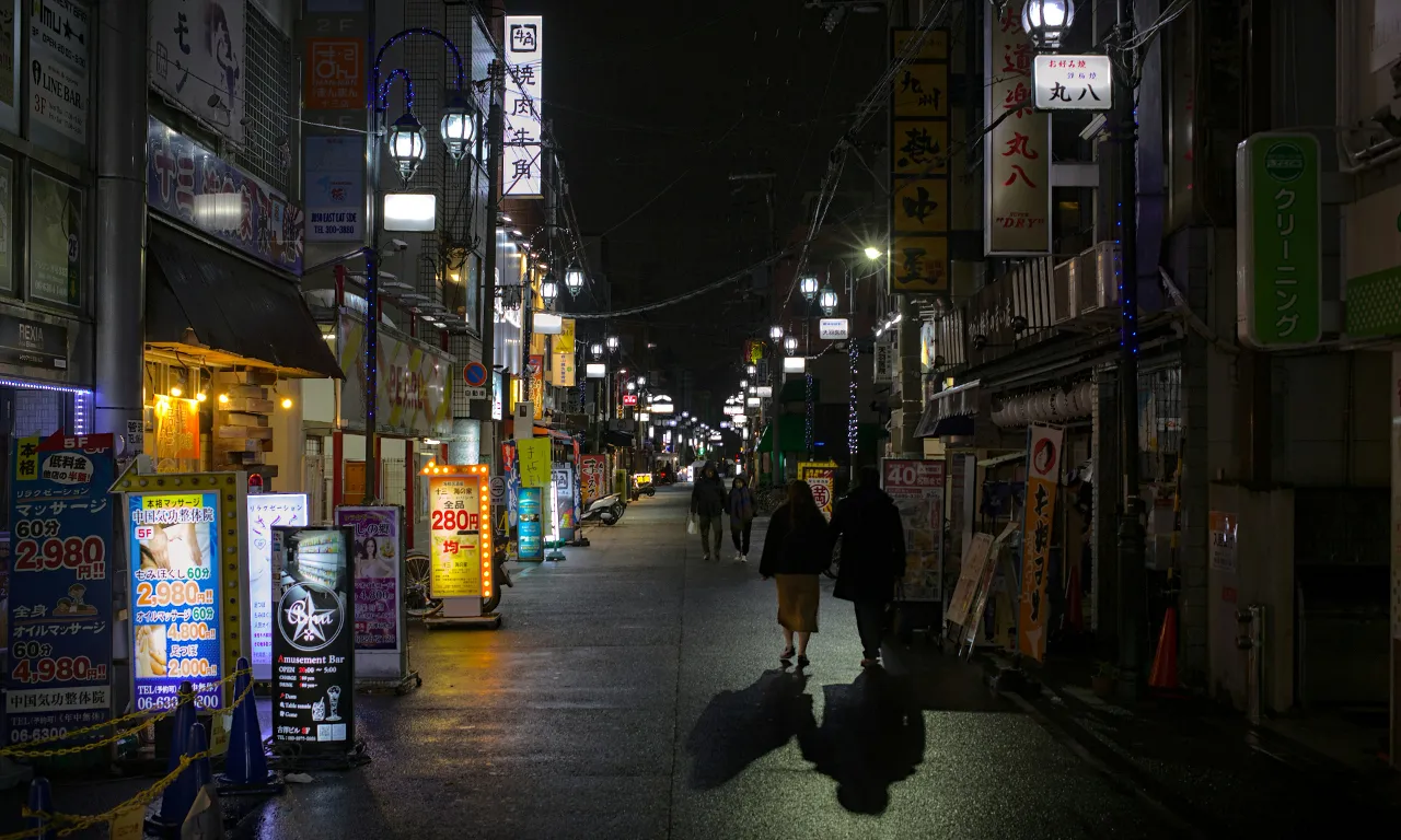 road surface, building, electricity, neighbourhood, sidewalk, alley, road, city, metropolitan area, window in Osaka Japan