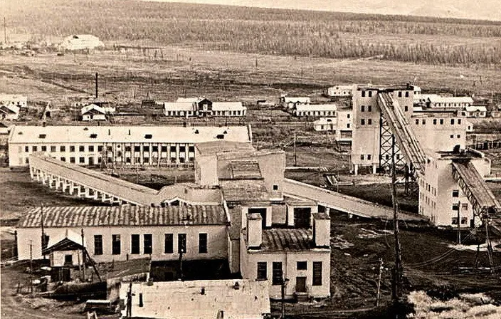 a black and white photo of an old town