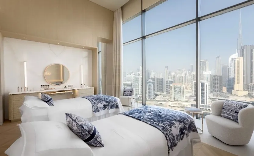 a bedroom with two beds and a view of the city,size1280x720